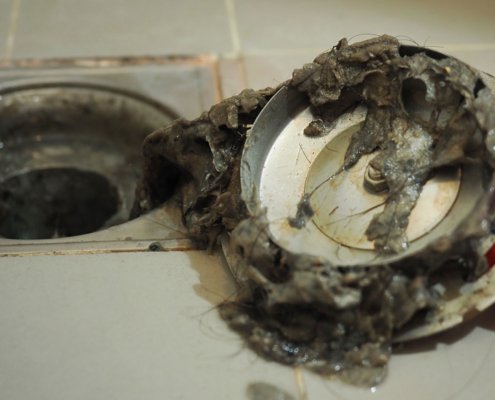why-does-my-shower-drain-smell?-common-causes-&-fixes